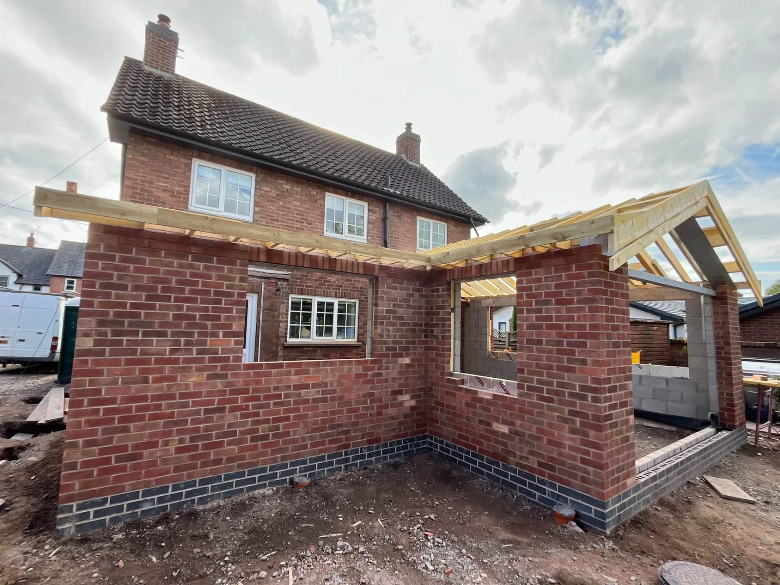 Single-storey extension with roof timbers going on