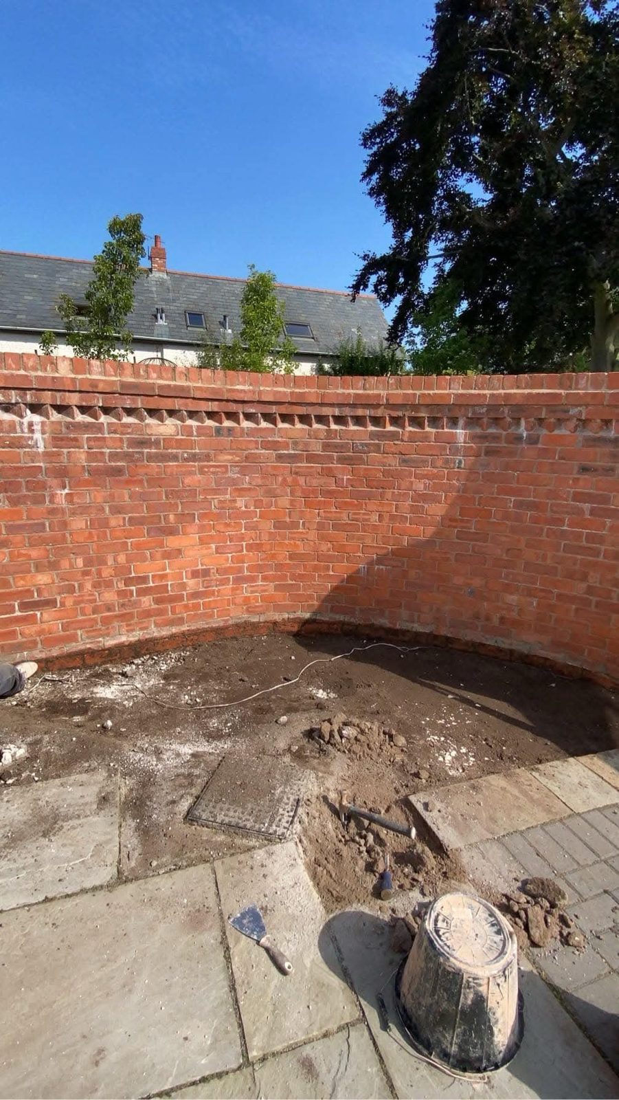 Curved garden wall under construction